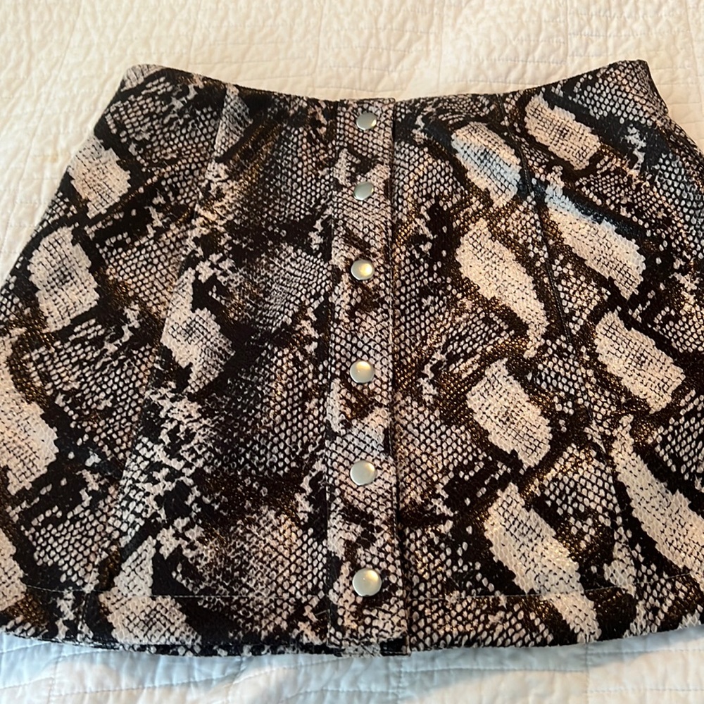 Urban Outfitters alligator print skirt size medium.  Leather like material.